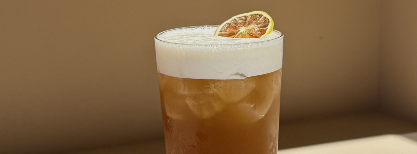 Homemade iced tea with dried lemon in the café